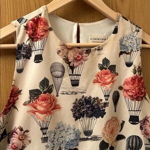 Made in Montreal! Sleeveless blouse. Size Small